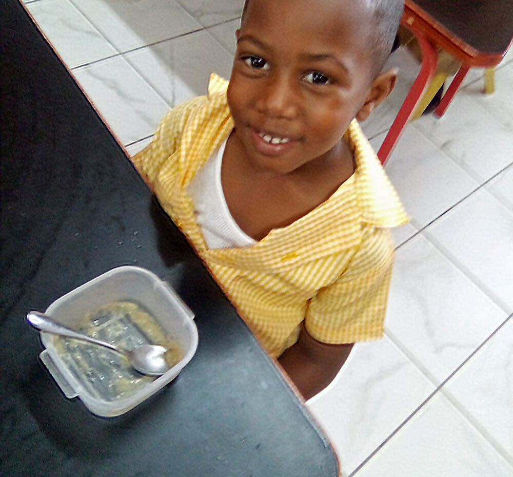 Jeffrey Town Basic3 - boy at breakfast